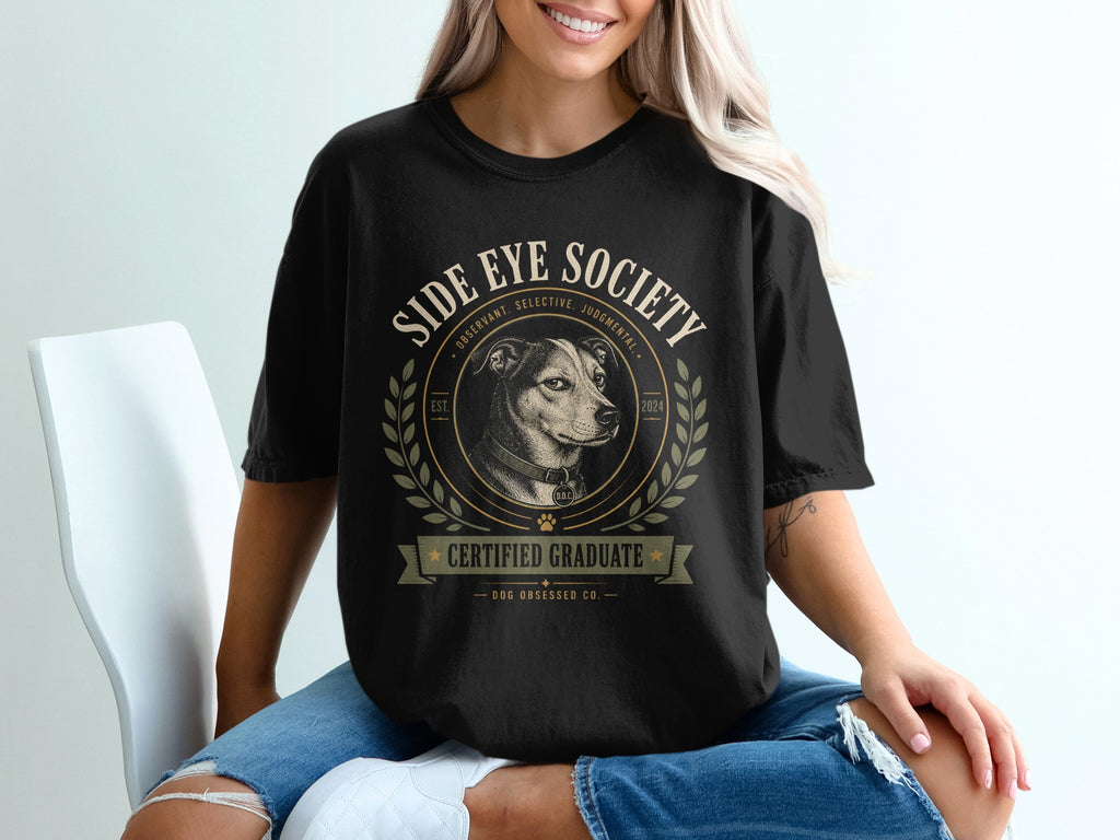 Black t-shirt with "Side Eye Society" dog graphic and "Certified Graduate" text.