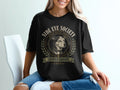 Black t-shirt with "Side Eye Society" dog graphic and "Certified Graduate" text.