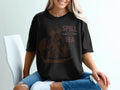 T-shirt with "Spill the Tea" text and a dog wearing sunglasses.