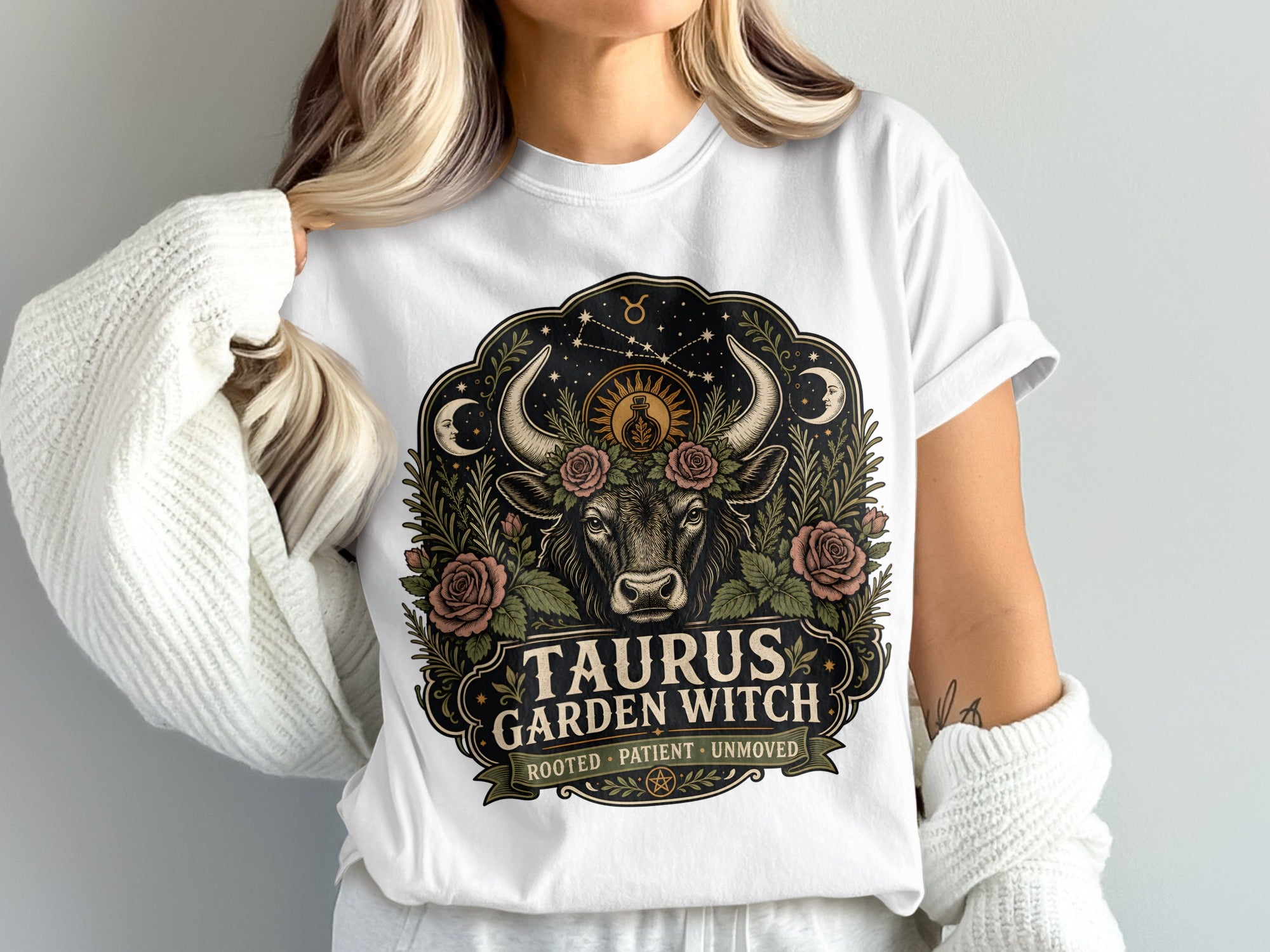 Taurus Garden Witch t-shirt with bull, roses, moons, sun, and stars design.
