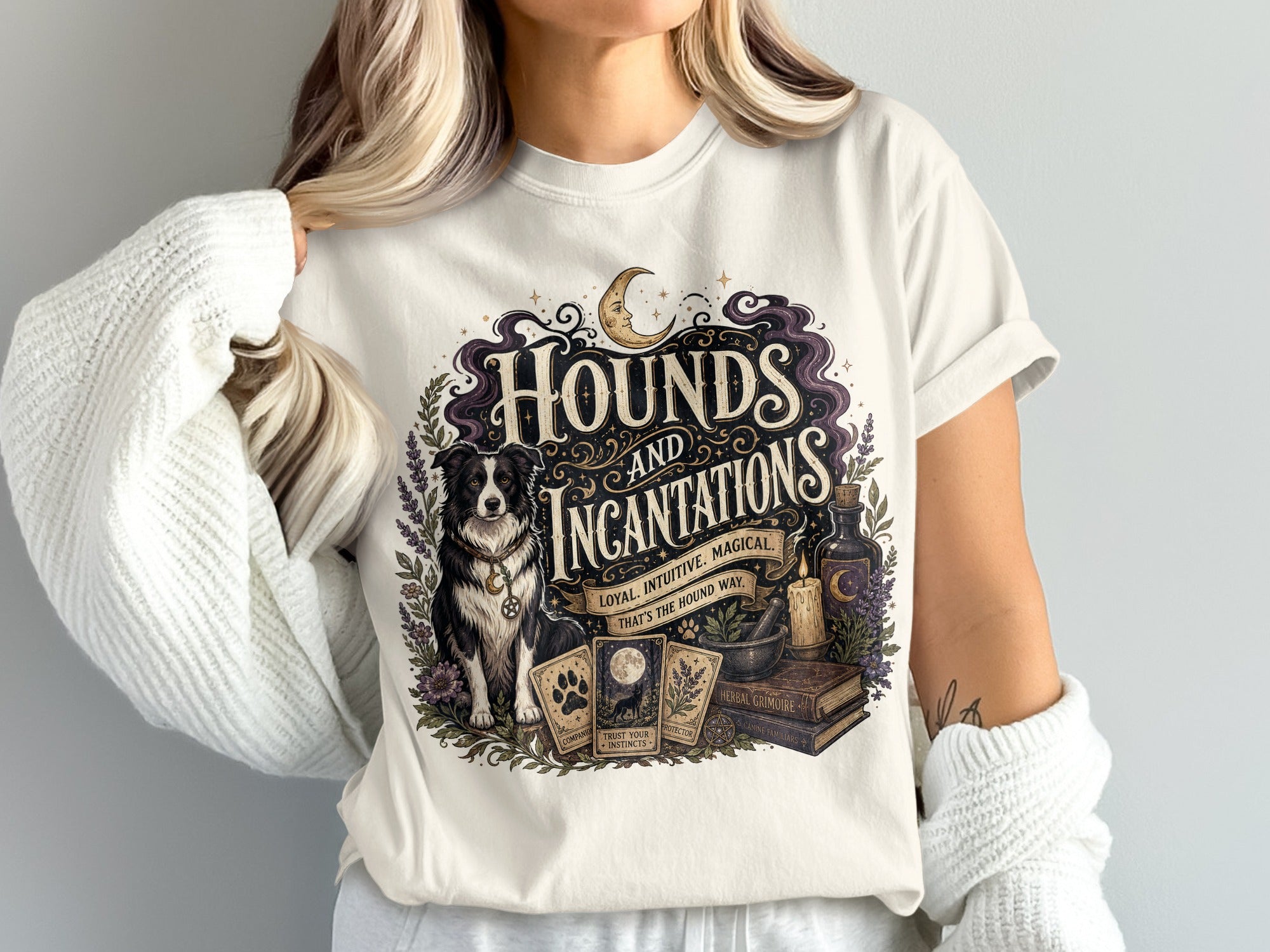 T-shirt with "Hounds and Incantations" text, a Border Collie, and mystical items.
