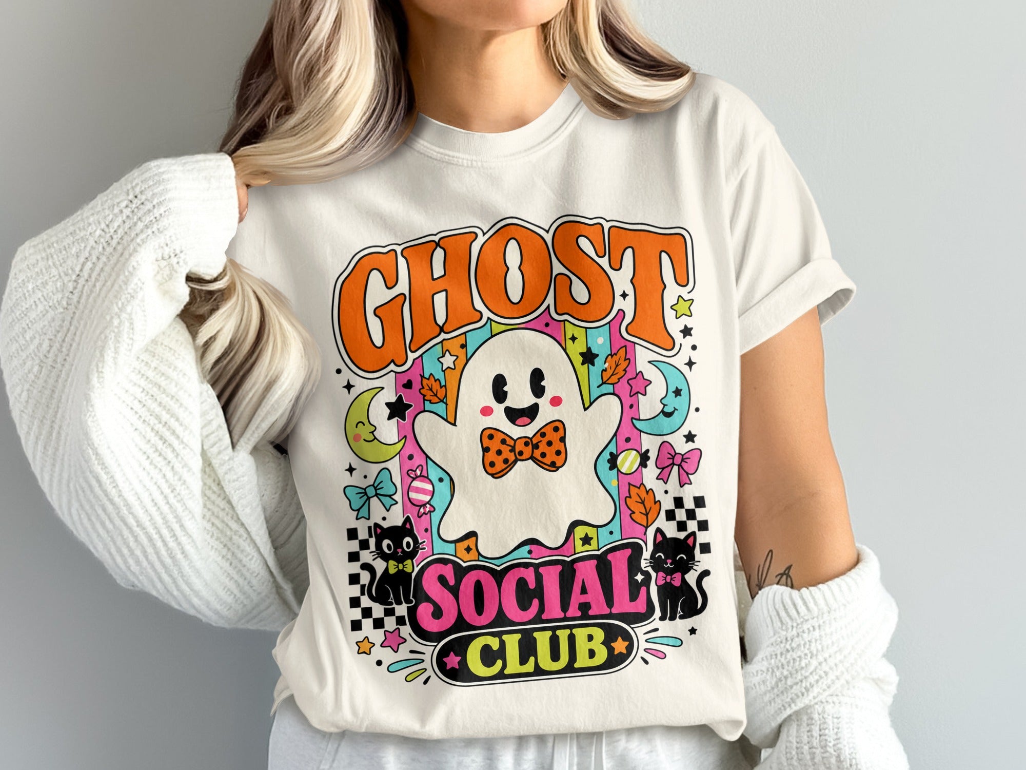 White t-shirt with a cute ghost, cats, and "Ghost Social Club" text.