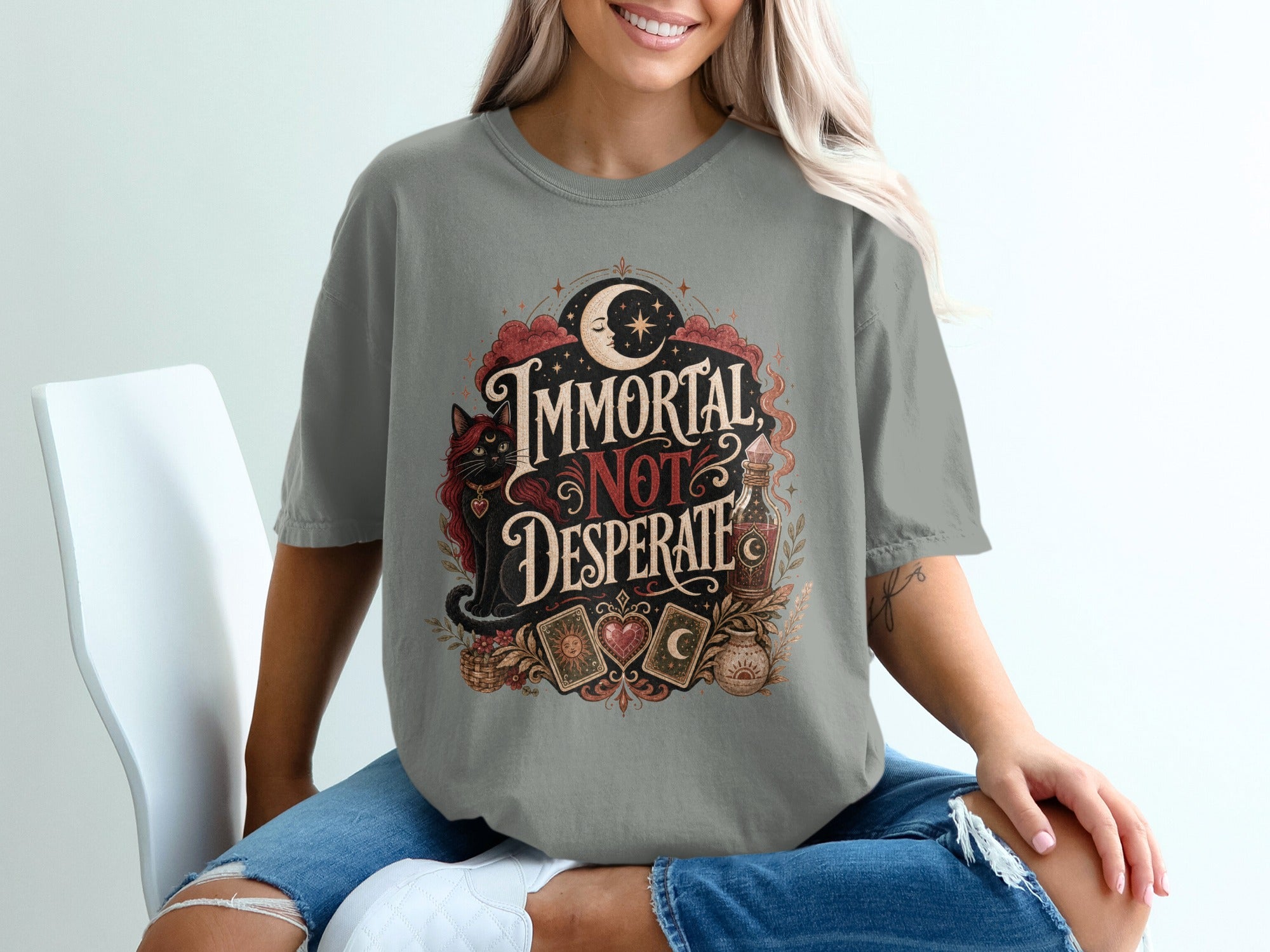 Gray t-shirt with "Immortal Not Desperate" text, black cat, and tarot cards.