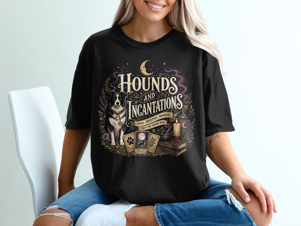 Black shirt with "Hounds and Incantations" design featuring a dog, tarot cards, candle, and books.