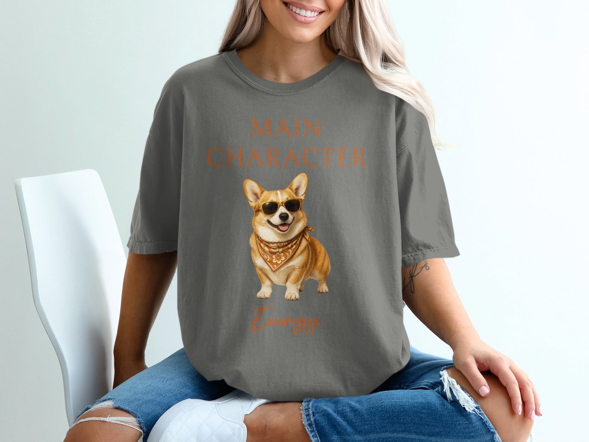 Gray t-shirt with "Main Character Energy" and a corgi wearing sunglasses.
