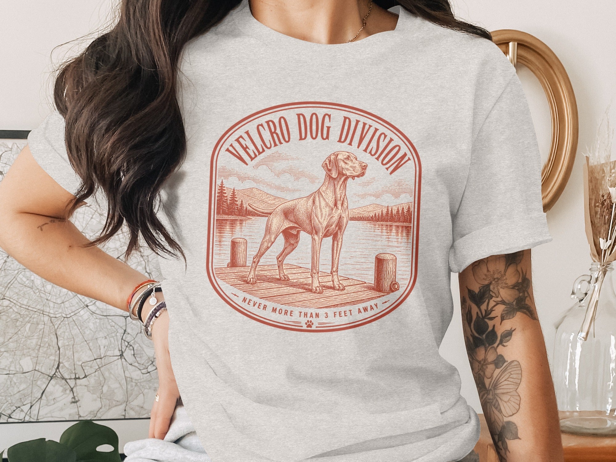 Grey t-shirt with "Velcro Dog Division Never More Than 3 Feet Away" graphic.