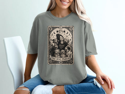 T-shirt graphic: woman embracing dogs, with text "THE DOG PARENT".