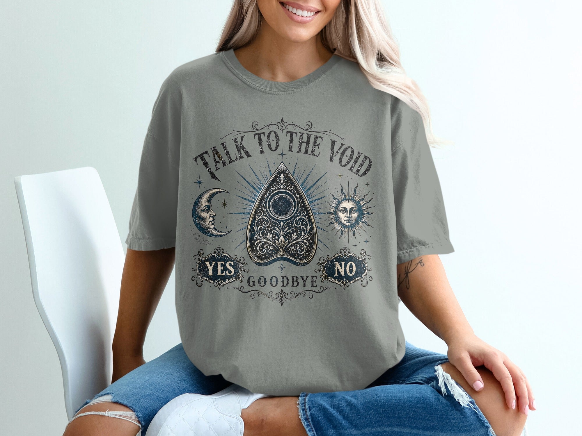 Ouija board graphic with "Talk to the Void" text, sun, and moon.