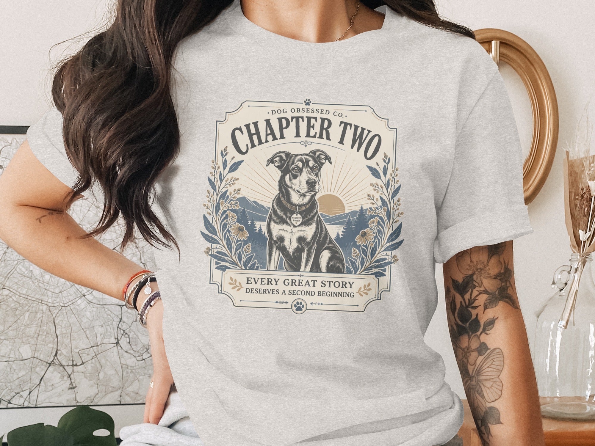 T-shirt featuring "Chapter Two" and a dog with the text "Every Great Story Deserves a Second Beginning."