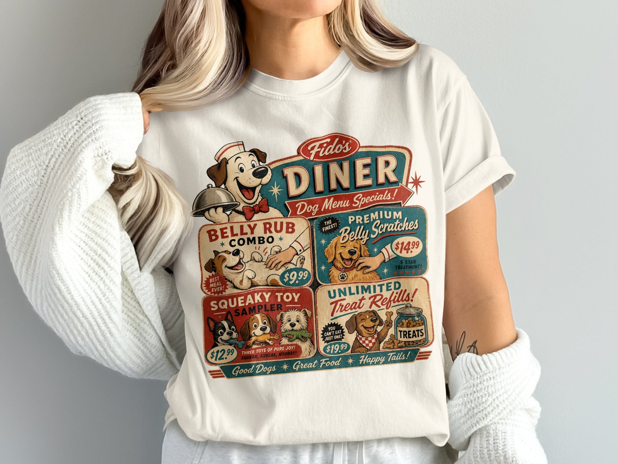 White t-shirt with "Fido's Diner Dog Menu Specials" graphic, featuring cartoon dogs and playful text.
