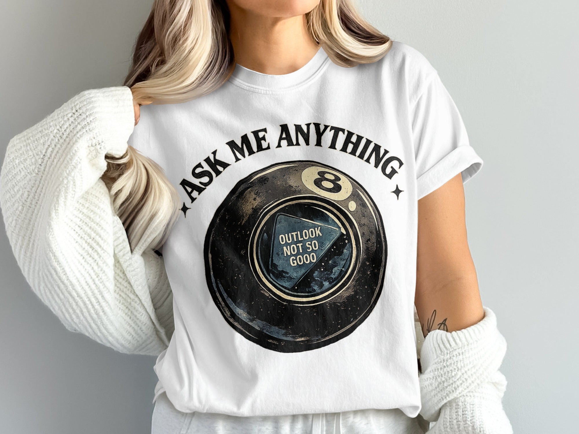 8 ball graphic t-shirt with text "Ask me anything" and "Outlook not so good".