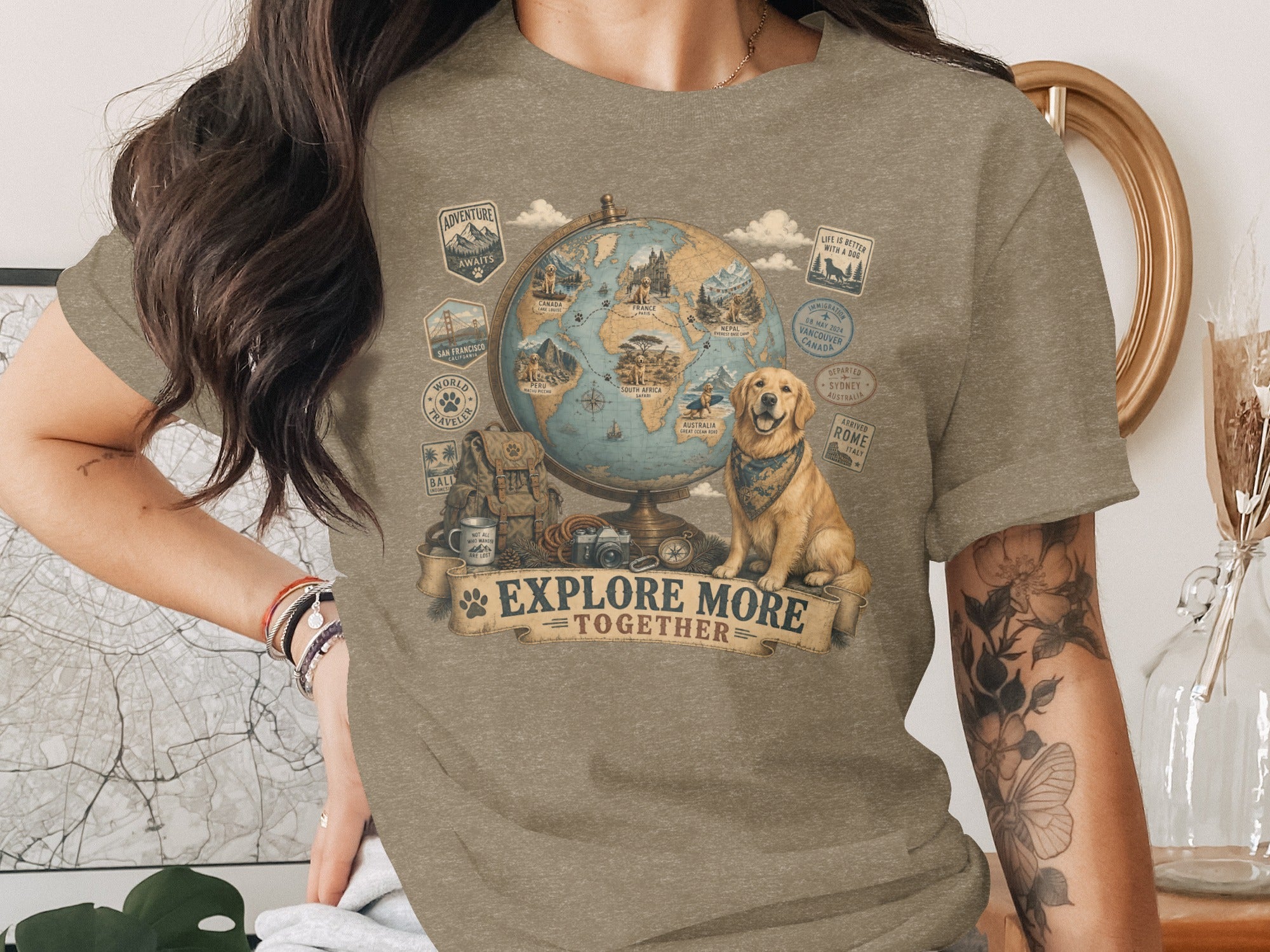 Golden retriever with bandana by globe and travel stamps, text "Explore More Together".