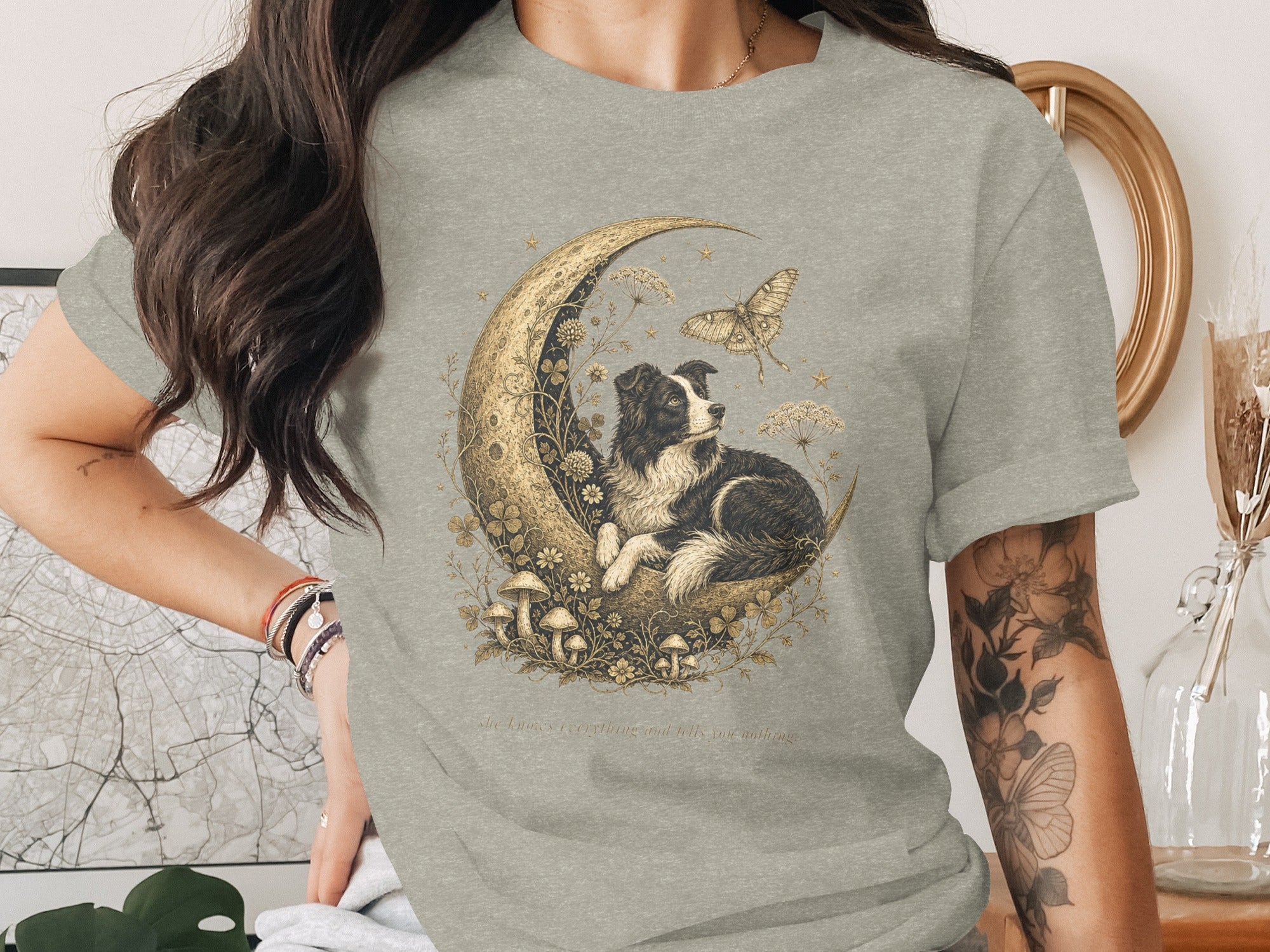 T-shirt with a border collie on a crescent moon with butterfly and text.