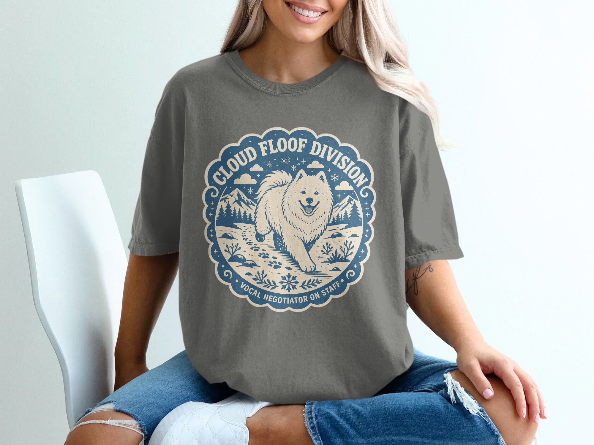 Grey t-shirt with "Cloud Floof Division Vocal Negotiator on Staff" graphic.