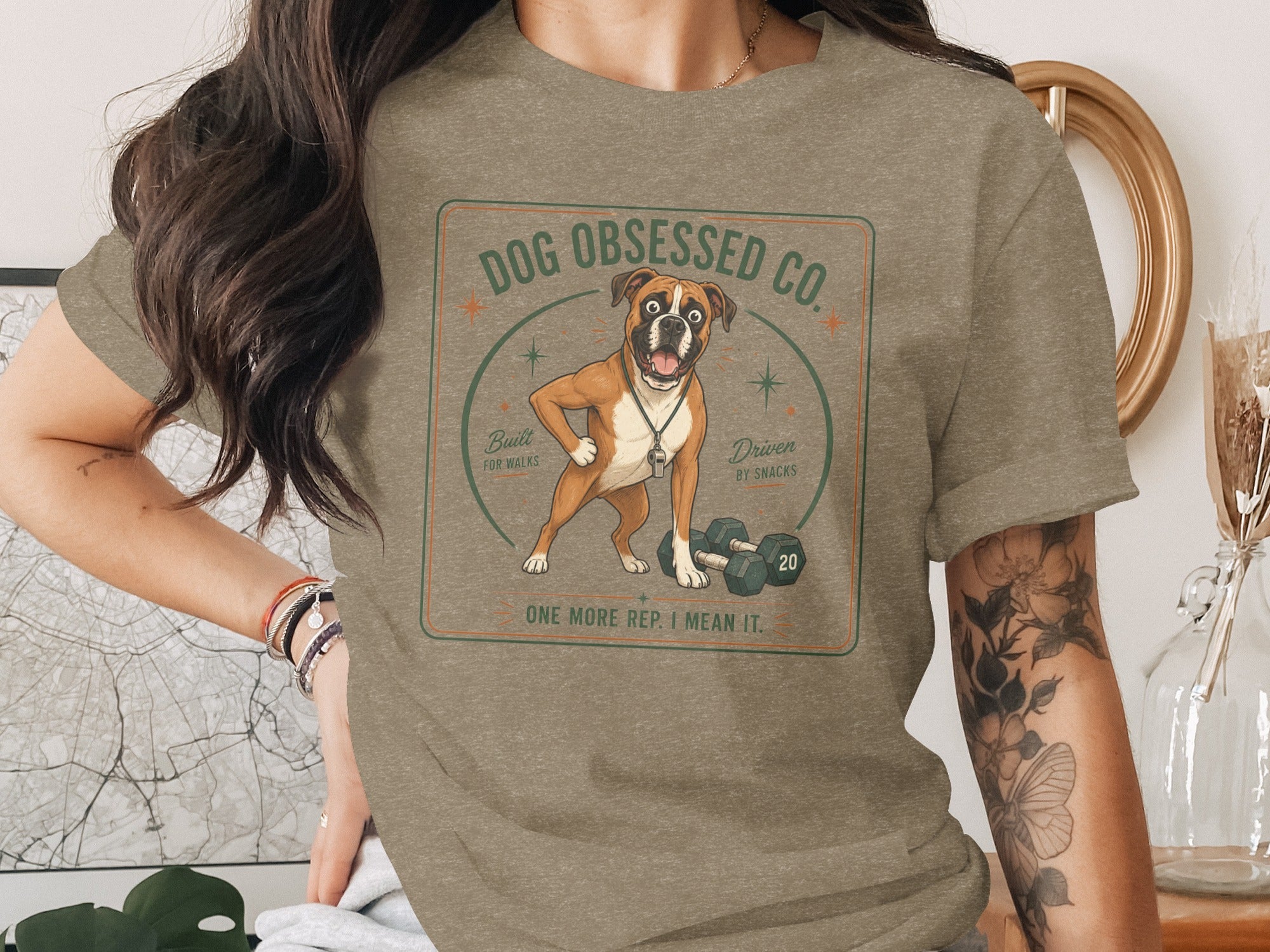 Boxer dog design with dumbbells and text "Dog Obsessed Co."