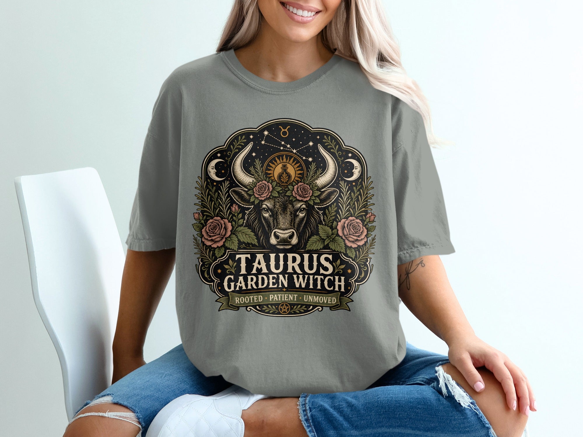 Taurus Garden Witch graphic on gray t-shirt with astrological symbols and roses.