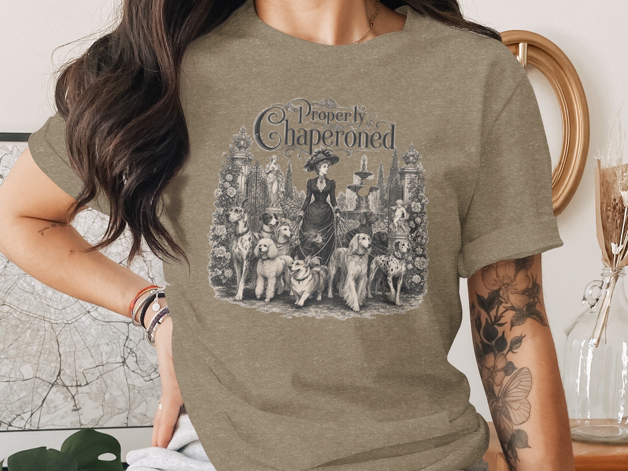 "Properly Chaperoned" text above woman walking dogs in garden scene.