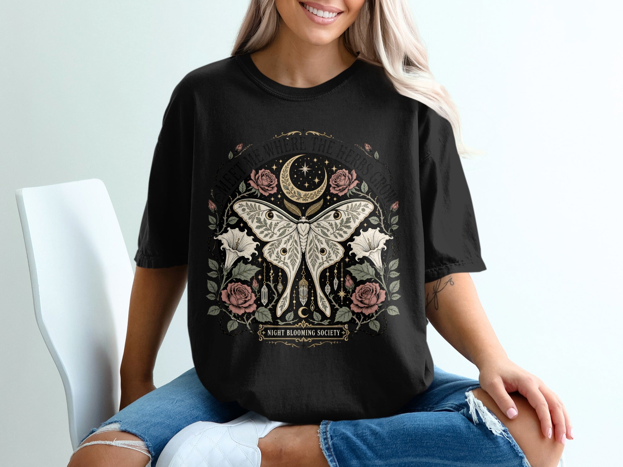 Black t-shirt with moth, moon, roses, and text "Night Blooming Society."