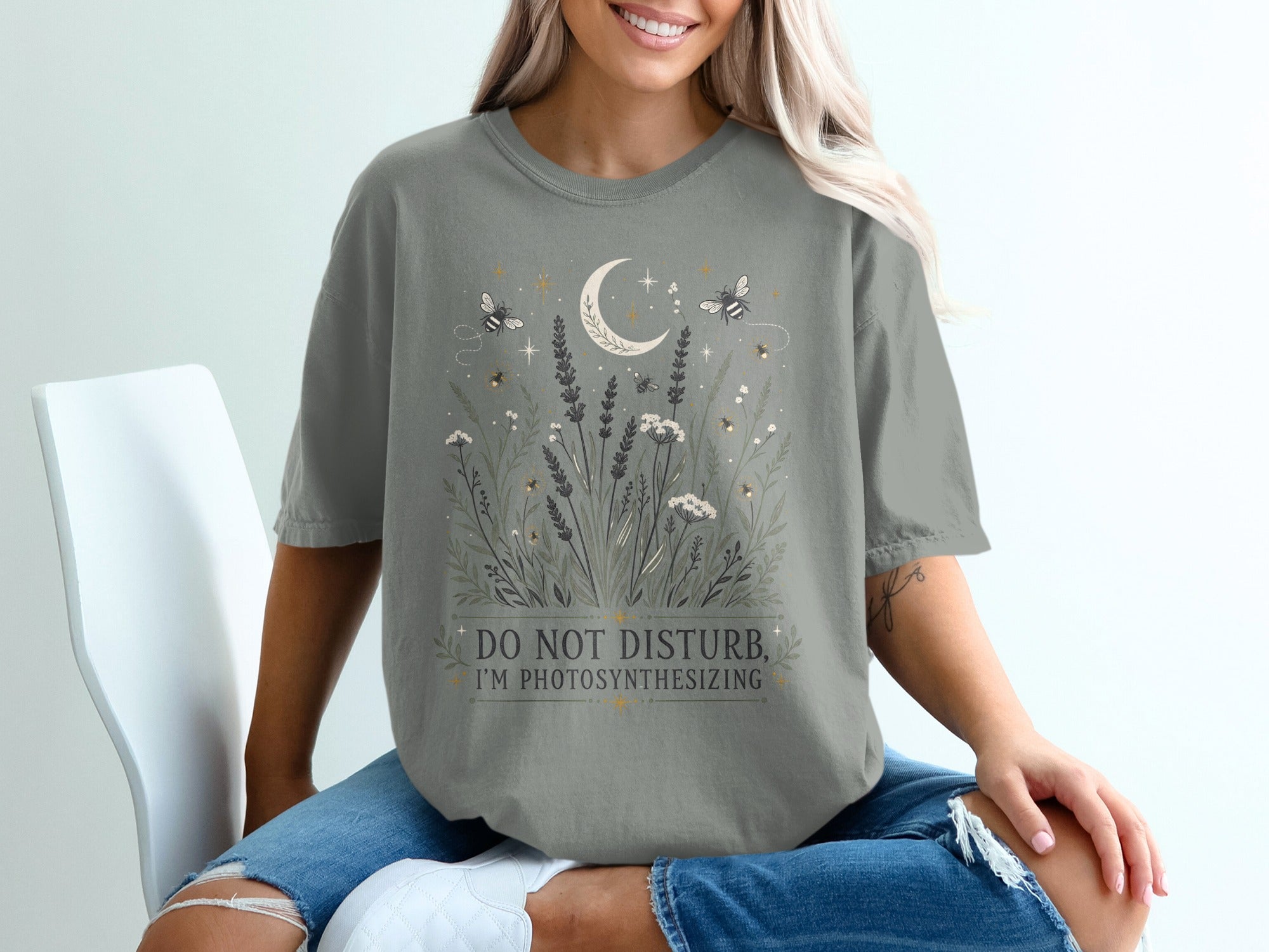 T-shirt with "DO NOT DISTURB, I'M PHOTOSYNTHESIZING" text and nature graphic.