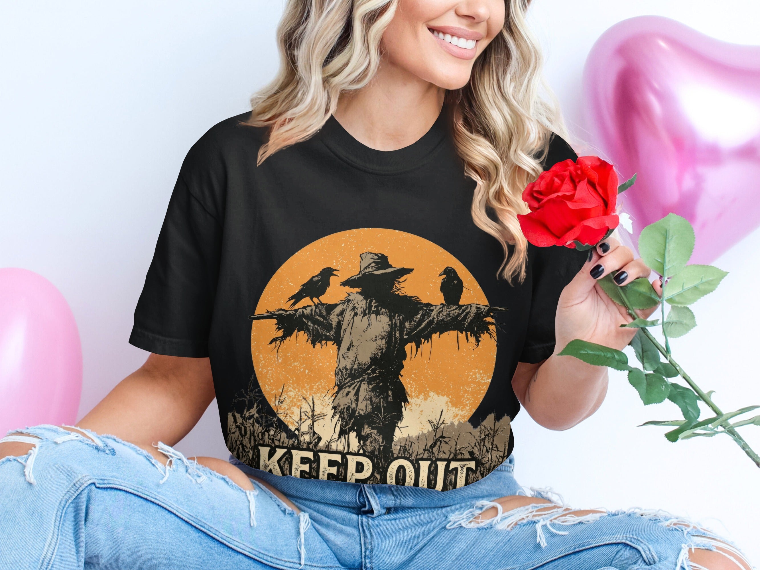 Black t-shirt with scarecrow, crows, cornfield, and "KEEP OUT" text design.