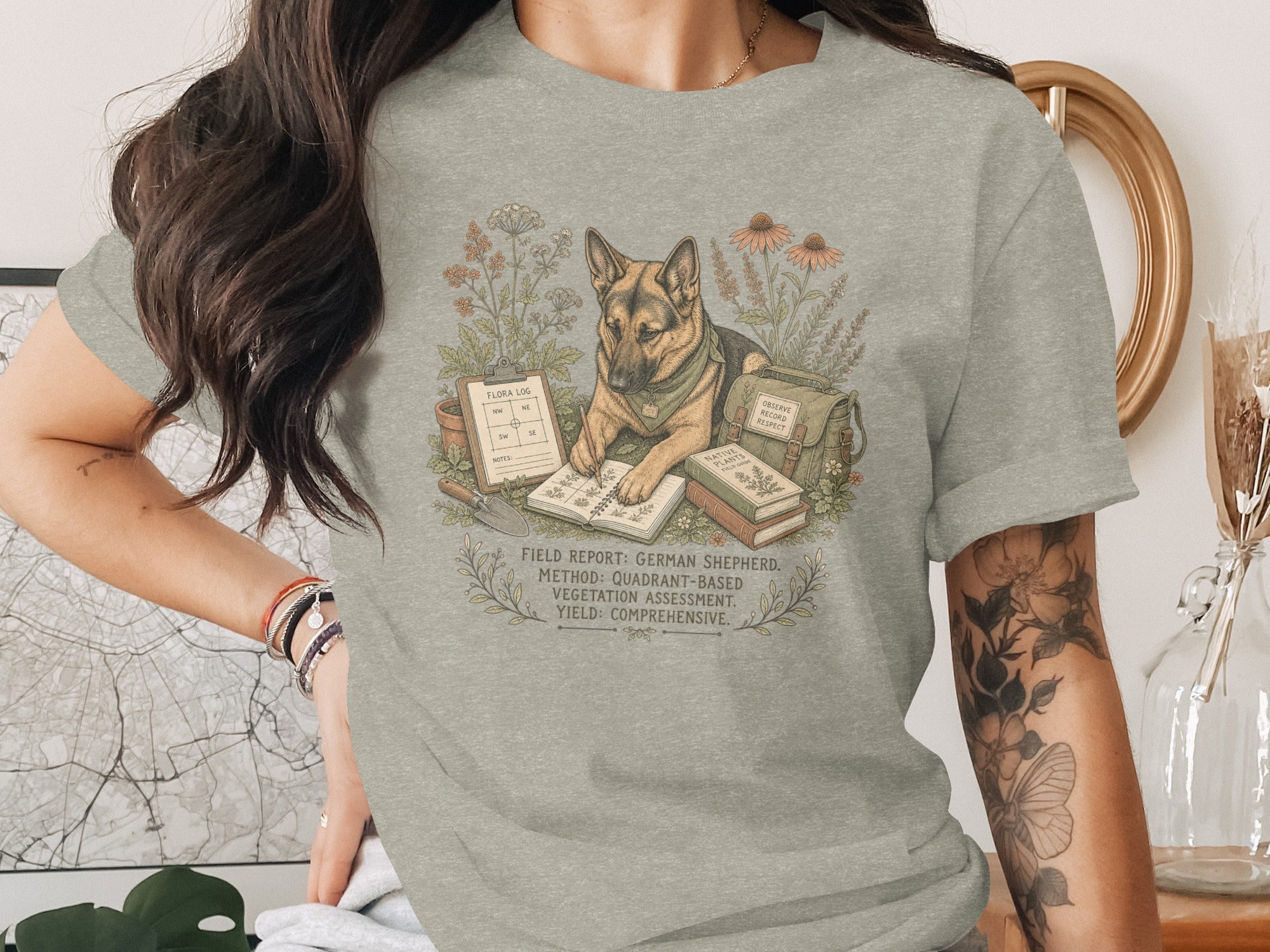 German Shepherd in botanical setting with flora log, books, and gardening tools.
