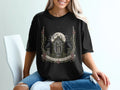 Black t-shirt with Haunt Hollow Cemetery graphic featuring a statue, moon, and crows.