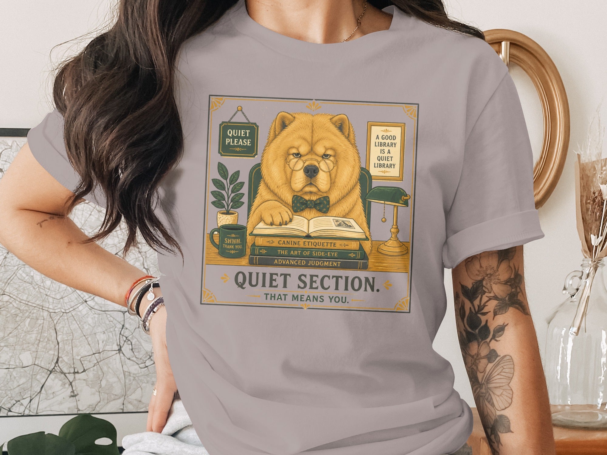 Chow chow dog wearing glasses reads "Quiet Section" on a t-shirt graphic.