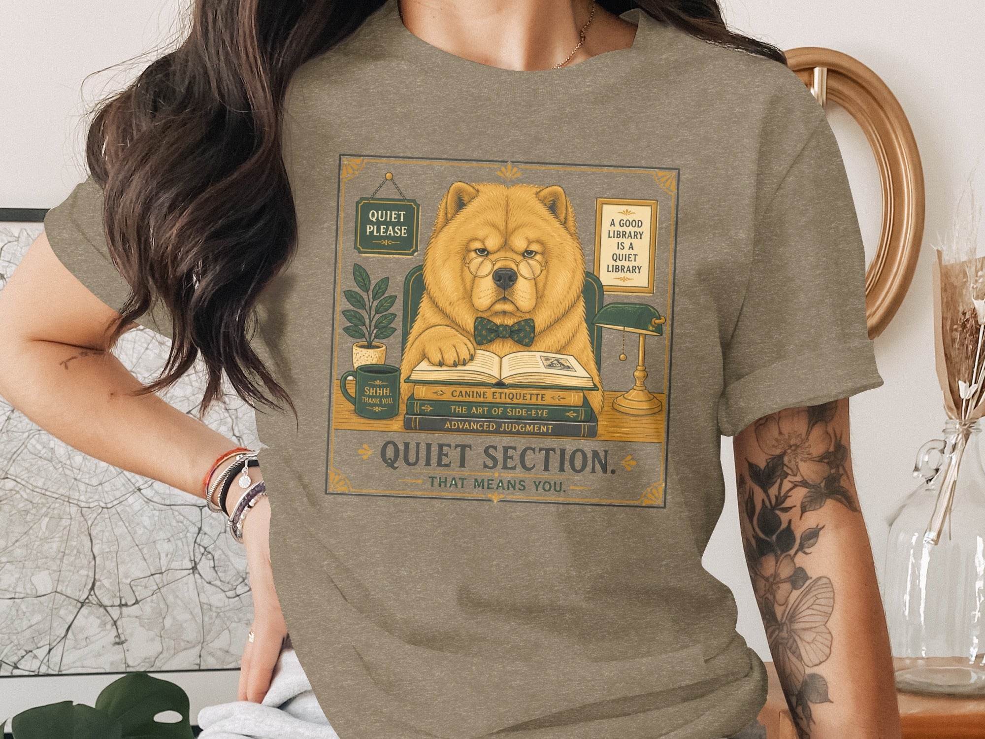 Chow chow with glasses reads books, with text "Quiet Section. That means you."