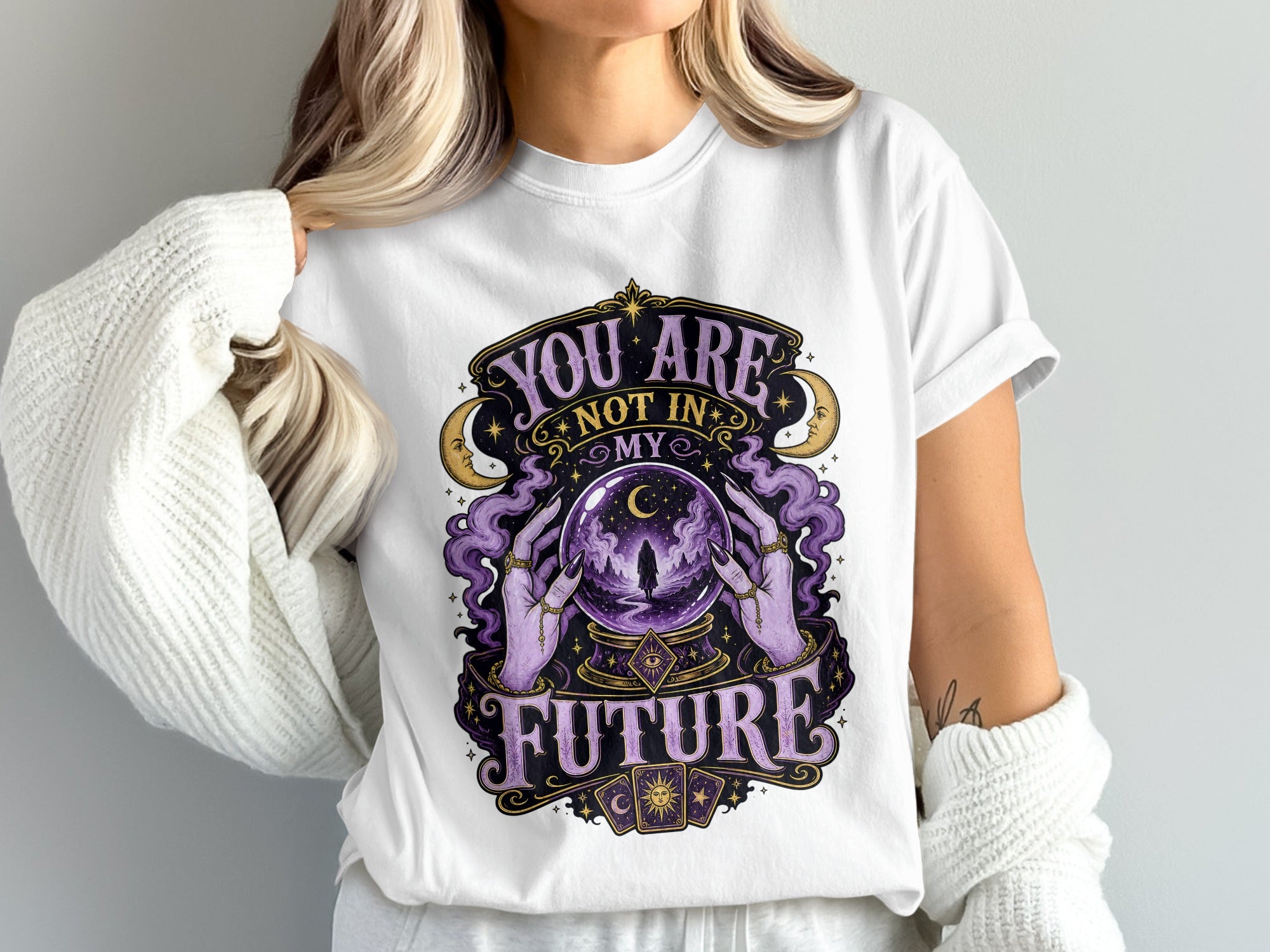 White t-shirt with "You Are Not In My Future" graphic of hands holding a crystal ball.