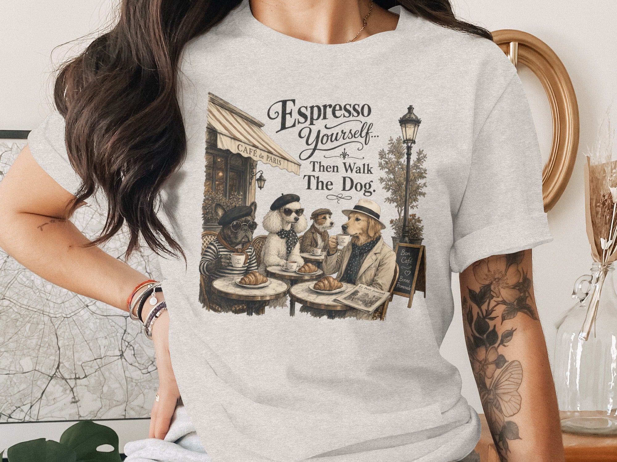 T-shirt graphic shows dogs at a cafe with text "Espresso Yourself... Then Walk The Dog."