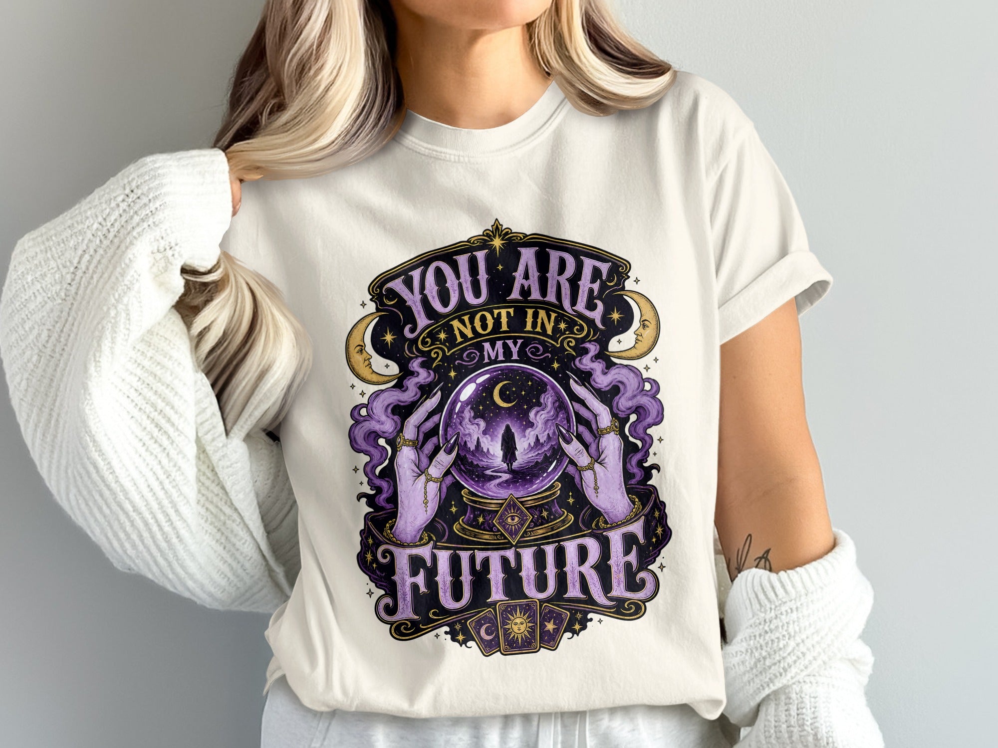Graphic on t-shirt: "You are not in my future" with crystal ball and tarot cards.