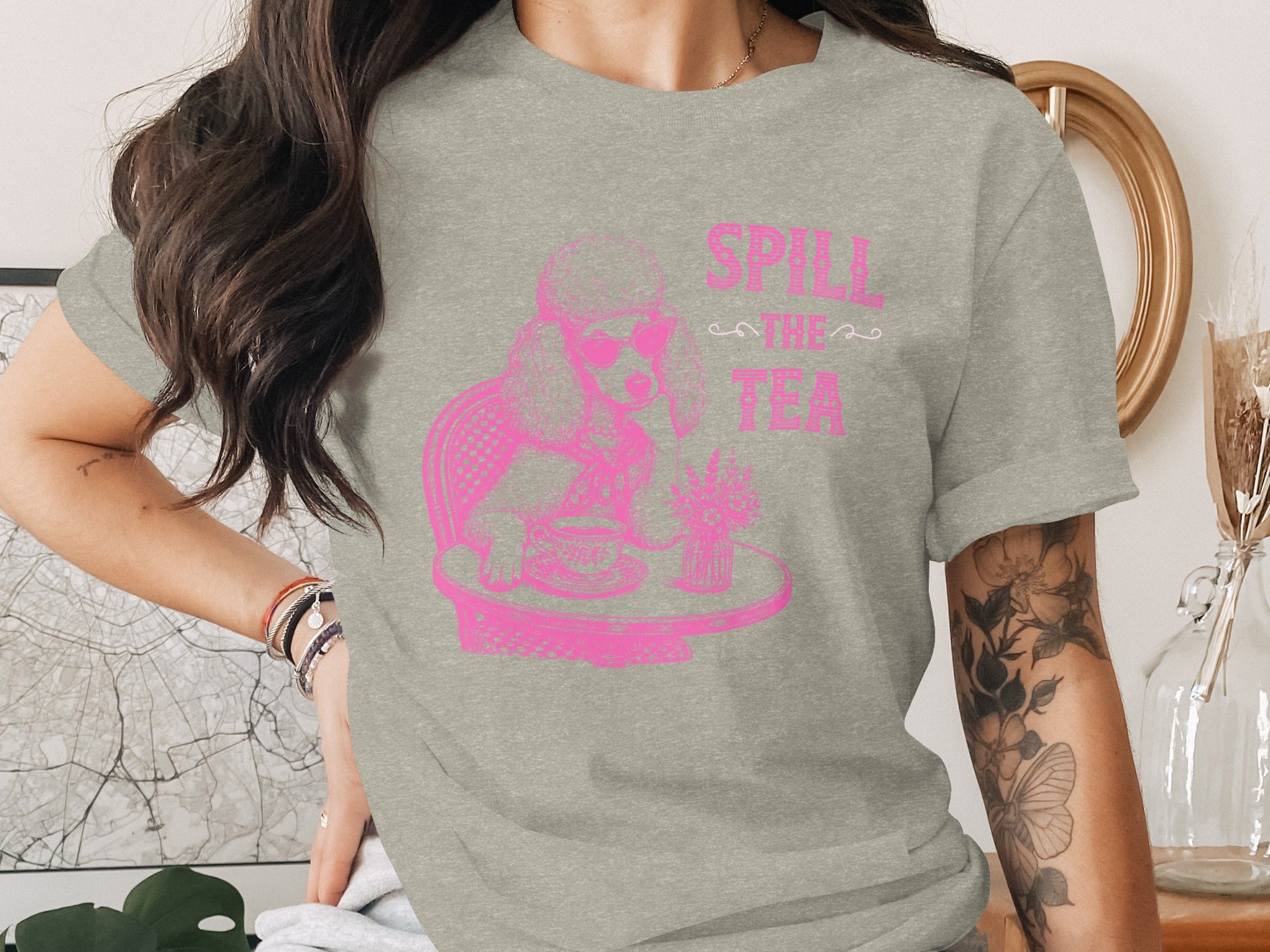 Grey t-shirt with pink poodle and "Spill The Tea" text graphic.
