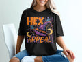 Black t-shirt with "HEX APPEAL" text, witch hat, moons, and spiders.
