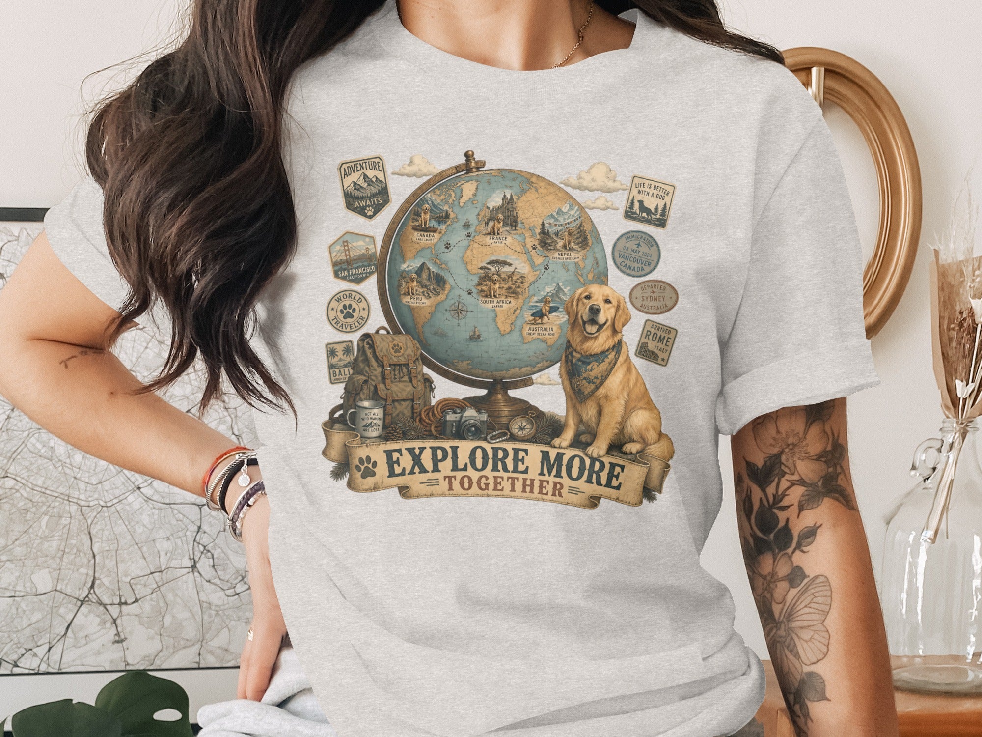 Golden retriever dog with globe and travel stickers, "Explore More Together" text.