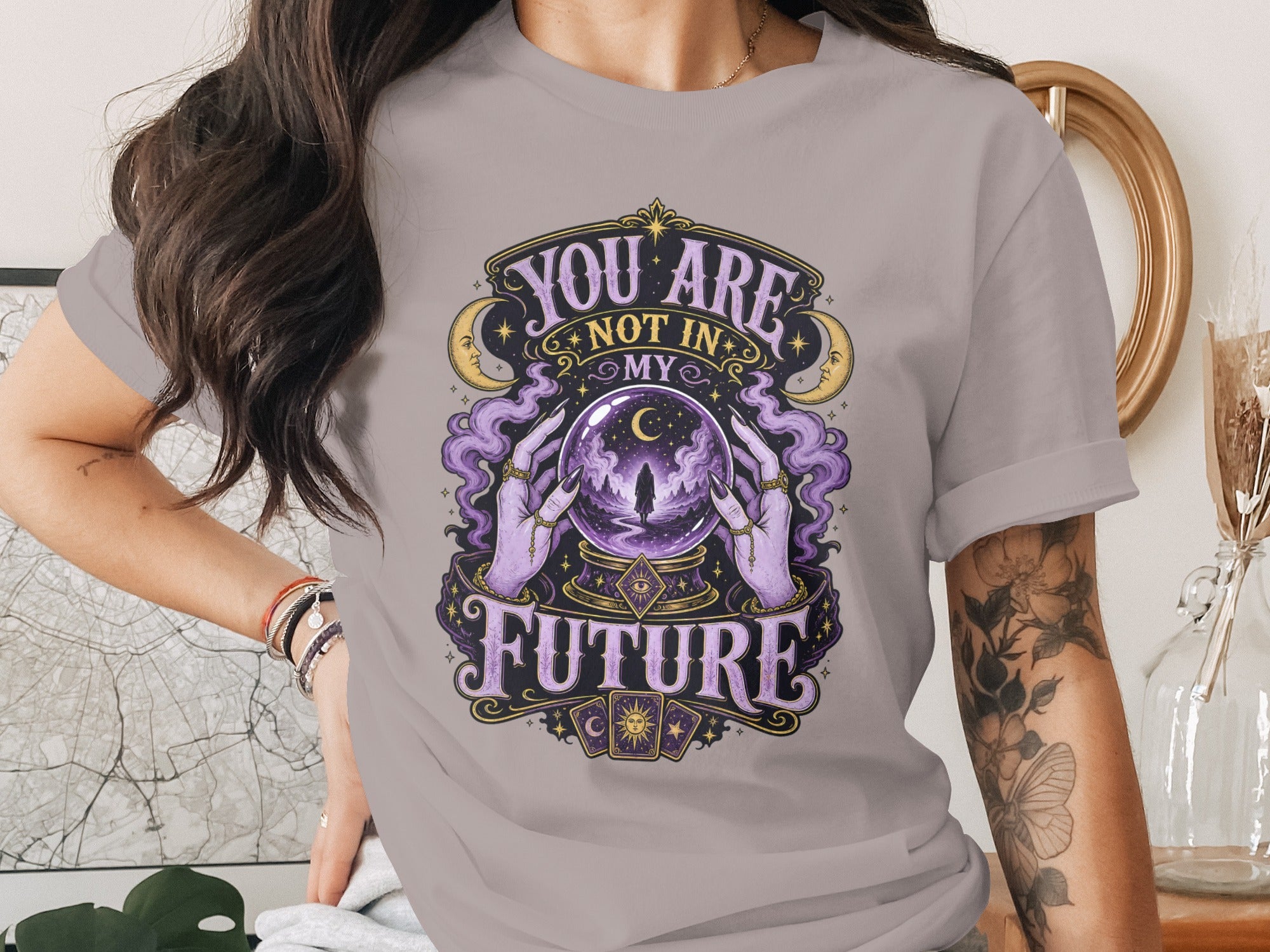 "You are not in my future" text with crystal ball, tarot cards, moons, and celestial design.