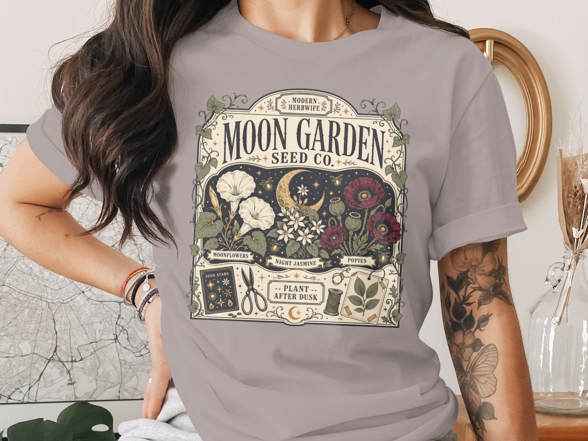 Moon Garden Seed Co. graphic with plants, moon, and tools; says "Plant After Dusk".