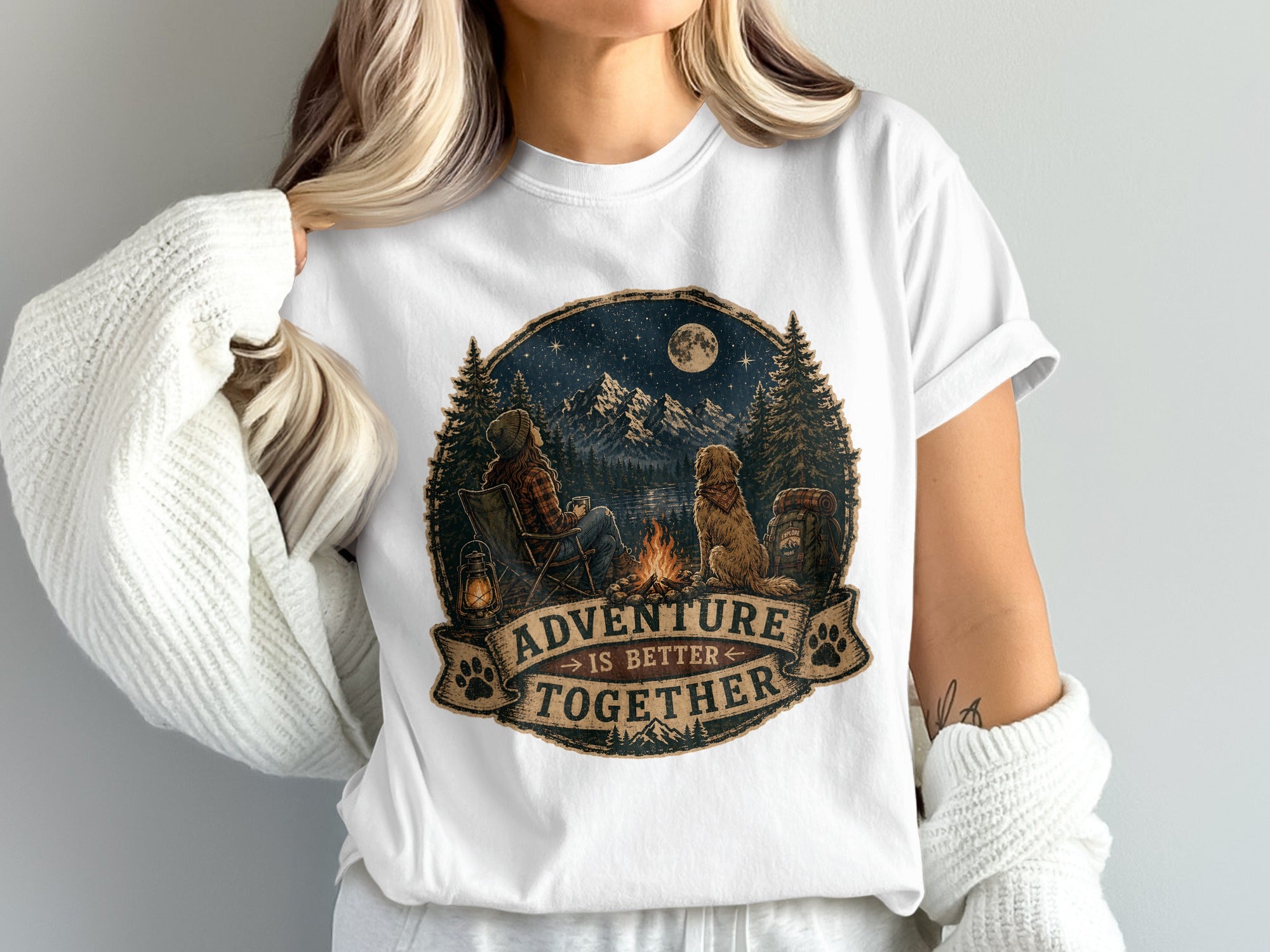 T-shirt graphic: person and dog camping under the moon, text "Adventure is Better Together".