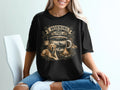 Black t-shirt graphic with a dog, campfire, mountains, and "Morning Fuel" text.